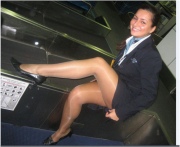 Stewardess in collant lucidi