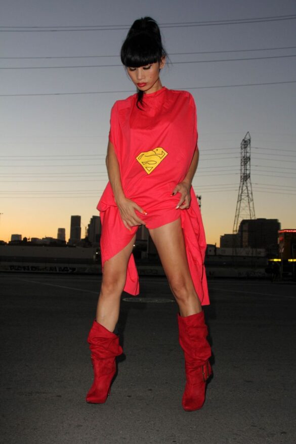 Bai Ling strips out of her Halloween Superman costume Los Angeles